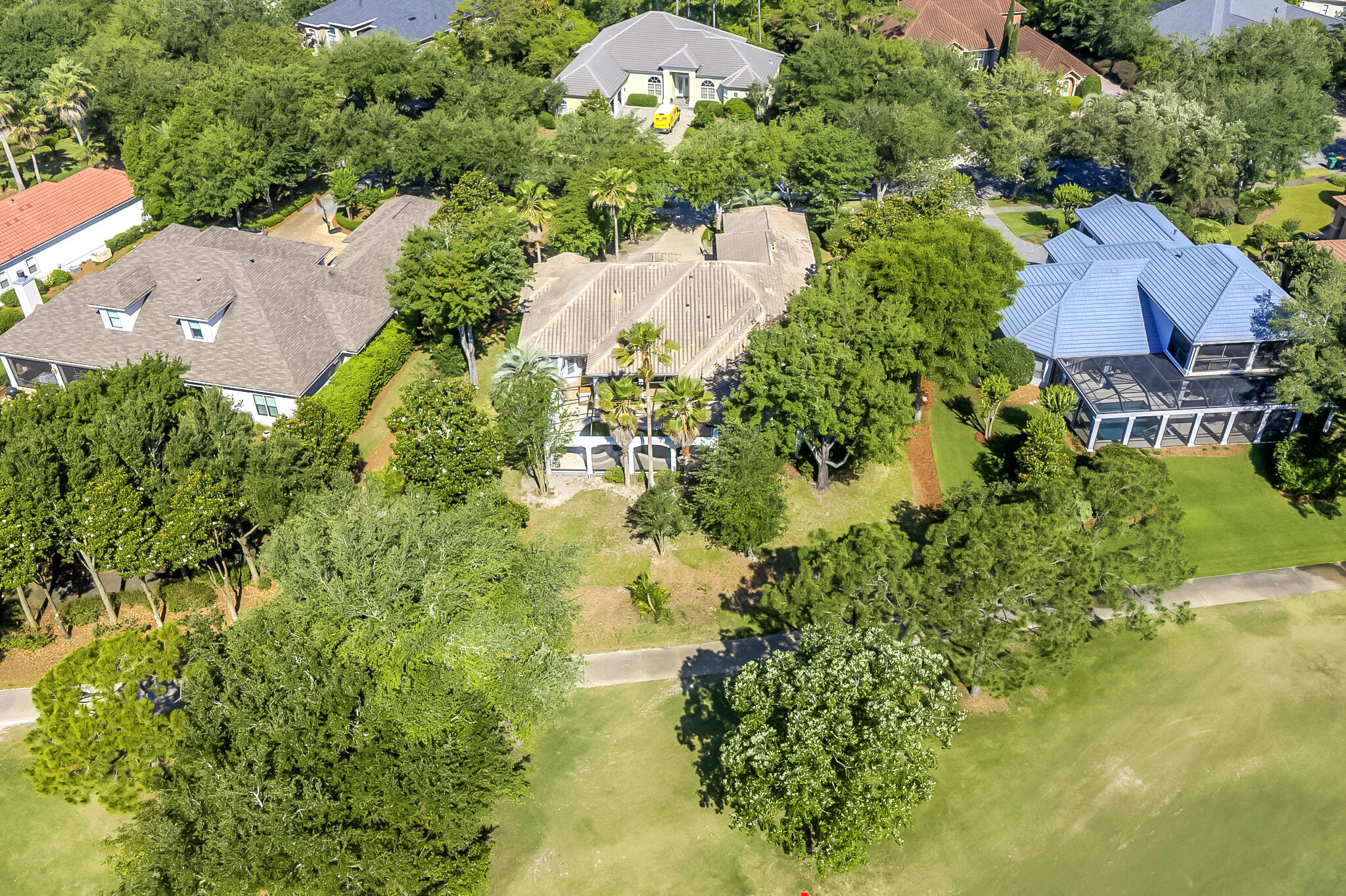 4372 Stonebridge Road Destin, FL 32541 - Photo 58 of 83 an aerial view of a house with a lake view