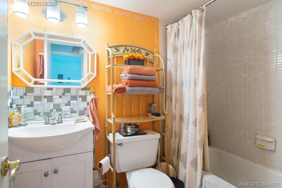 1989 Southwest Palm City Road, Unit J Stuart, FL 34994 - Photo 14 of 16 SECOND FULL BATH, TUB & SHOWER