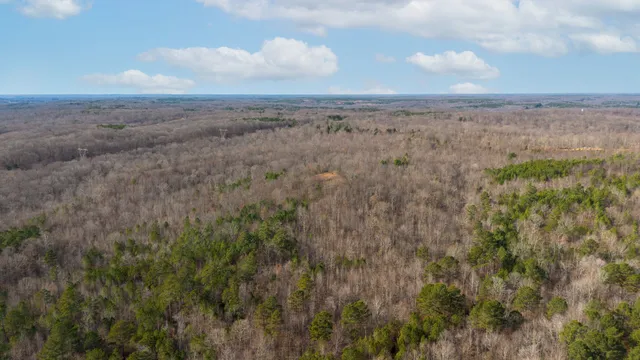 a view of a yard next to a yard