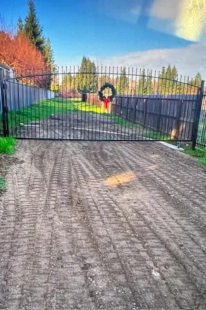 a view of a backyard with a street