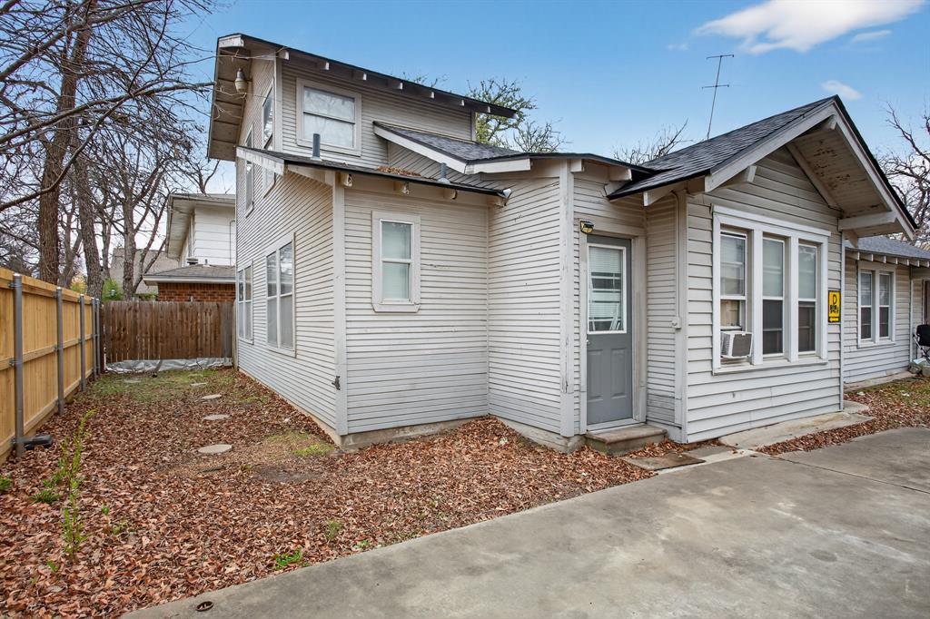 1111 North Austin Street Denton, TX 76201 - Photo 19 of 28 a view of a house with a yard
