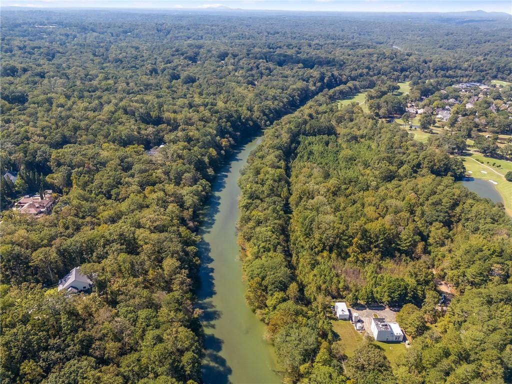 8290 Jett Ferry Road Atlanta, GA 30350 - Photo 3 of 16 an aerial view of residential house with outdoor space