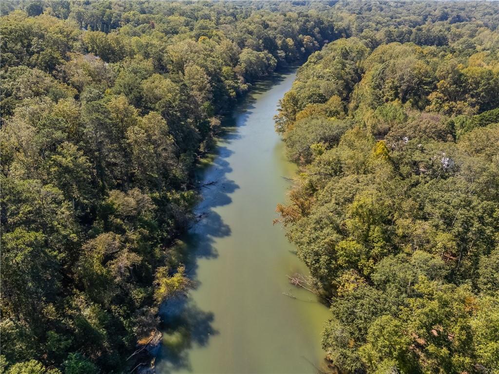 8290 Jett Ferry Road Atlanta, GA 30350 - Photo 6 of 16 a view of a lake with a mountain view