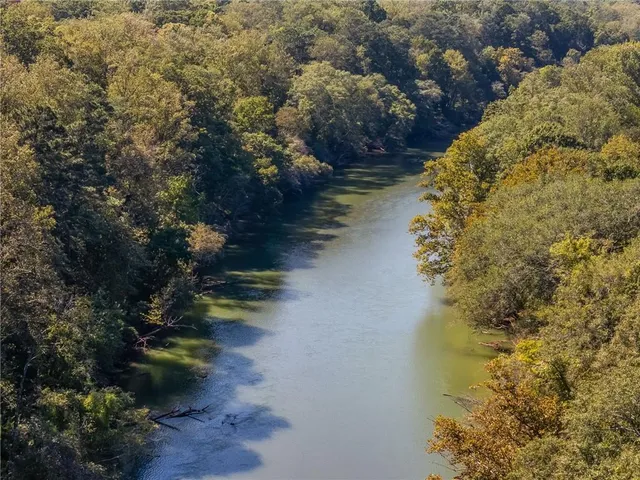a view of a lake with a mountain in the background