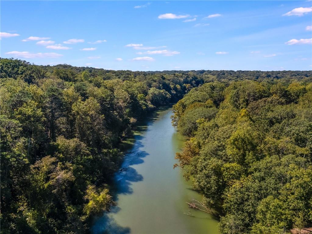 8290 Jett Ferry Road Atlanta, GA 30350 - Photo 9 of 16 a view of a lake with a mountain in the background