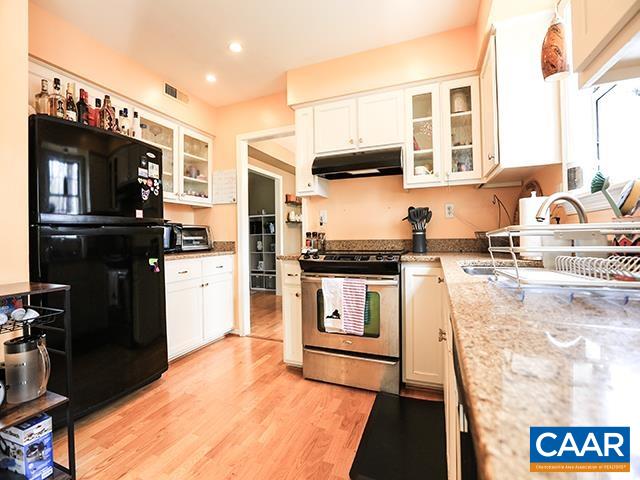 150 Olton Place Charlottesville, VA 22902 - Photo 14 of 40 a kitchen with stainless steel appliances granite countertop a refrigerator and stove
