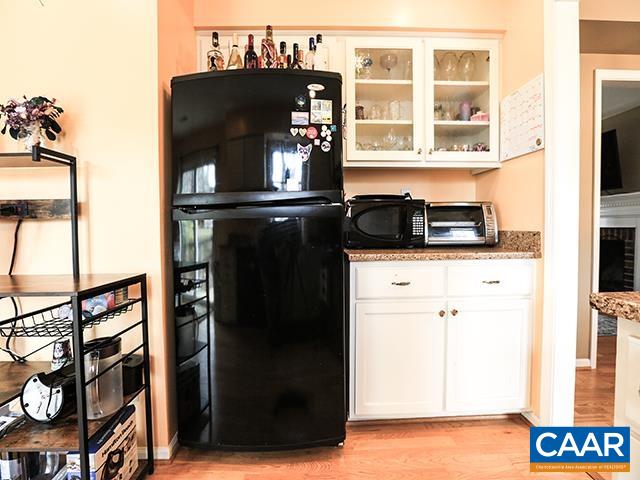 150 Olton Place Charlottesville, VA 22902 - Photo 15 of 40 a kitchen with a refrigerator and a stove