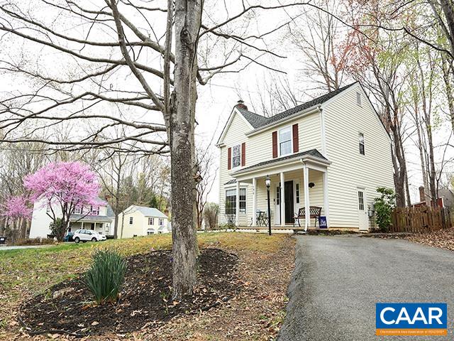 150 Olton Place Charlottesville, VA 22902 - Photo 2 of 40 a view of a white house with a snow on the road and a building