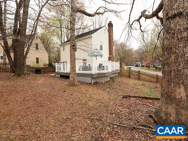 150 Olton Place Charlottesville, VA 22902 - Photo 29 of 40 a backyard of a house with barbeque oven and outdoor seating