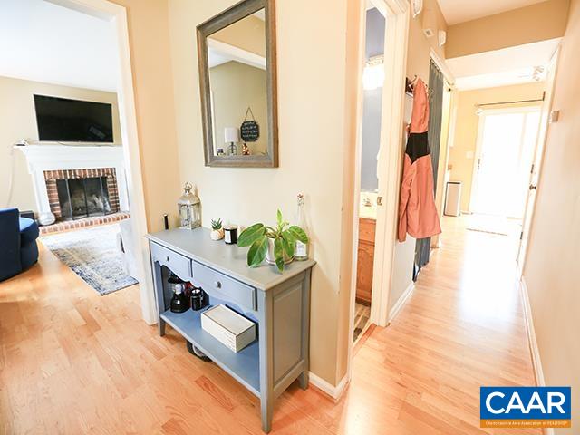 150 Olton Place Charlottesville, VA 22902 - Photo 9 of 40 a view of living room with furniture and a flat screen tv