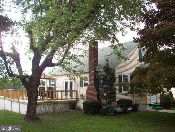 4313 Chapel Road Perry Hall, MD 21128 - Photo 1 of 23 a front view of house with yard and green space