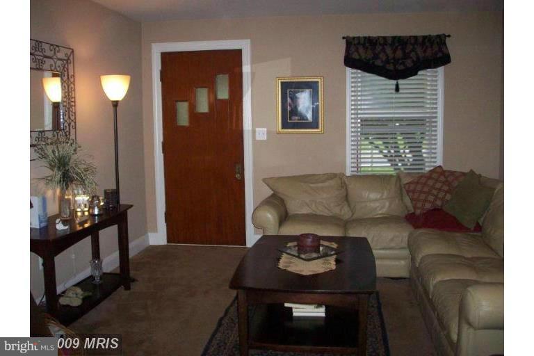 4313 Chapel Road Perry Hall, MD 21128 - Photo 4 of 23 a living room with furniture and a window