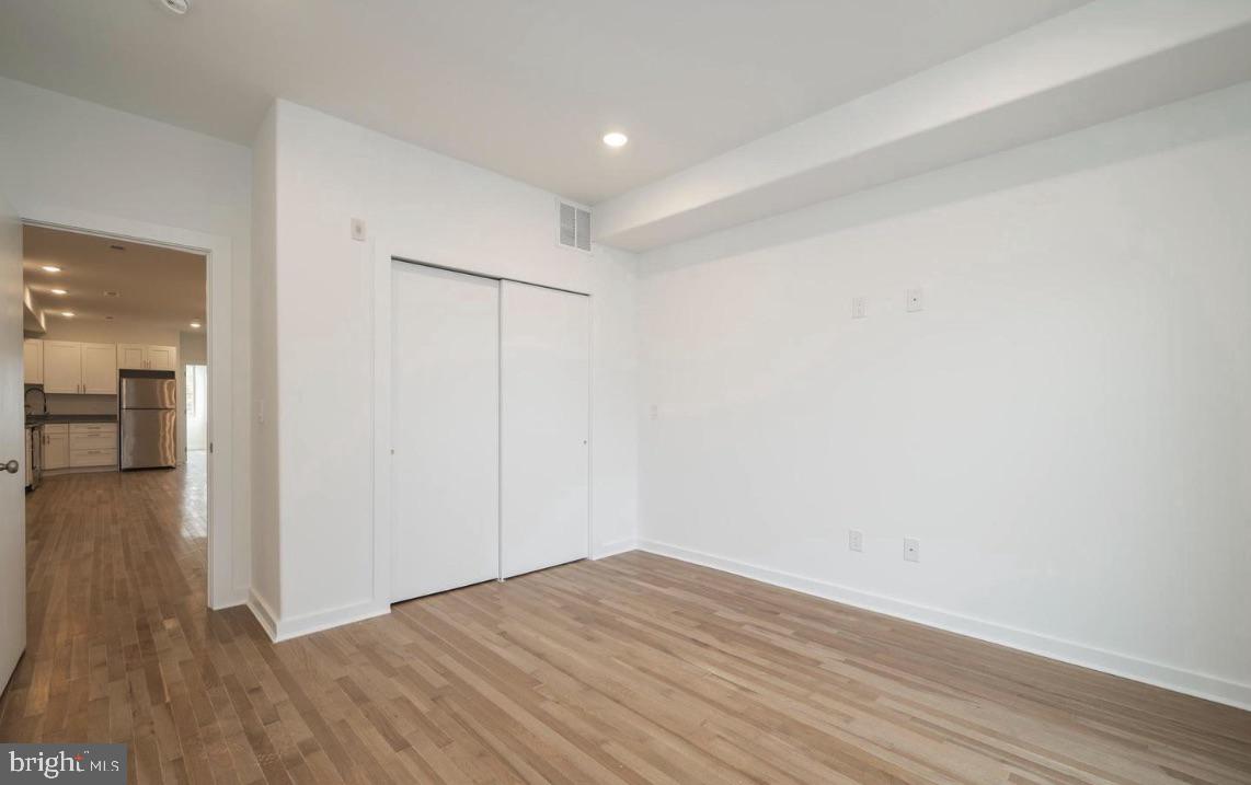 727 North 39th Street, Unit 2 Philadelphia, PA 19104 - Photo 13 of 15 a view of a room with wooden floor