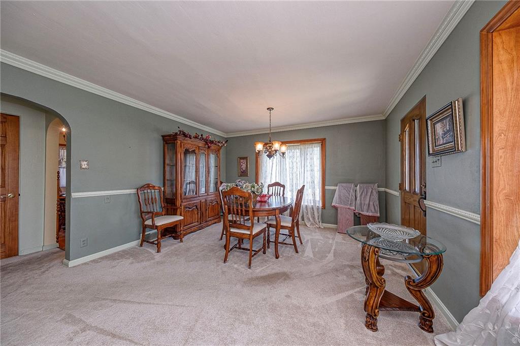 699 Kaye Avenue Monaca, PA 15061 - Photo 9 of 43 a living room with furniture and a window