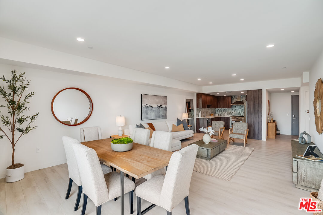 1021 South Shenandoah Street, Unit 501 Los Angeles, CA 90035 - Photo 4 of 19 a view of a dining room with furniture