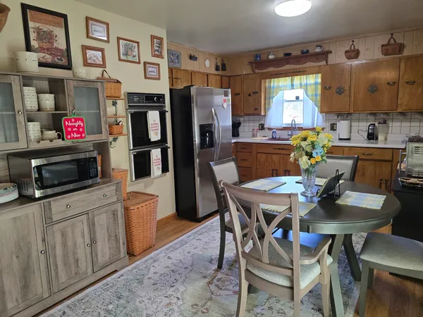 a view of a dining room with furniture