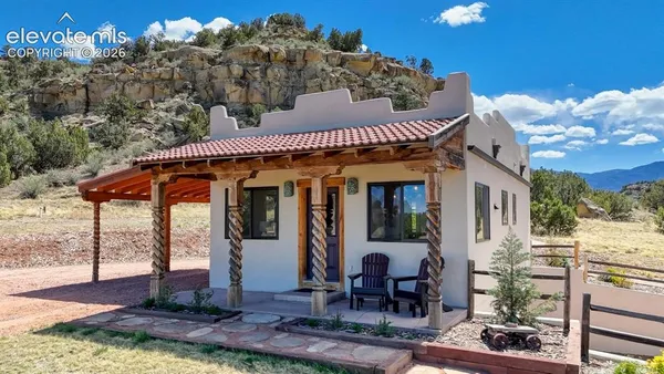 a front view of a house with a porch