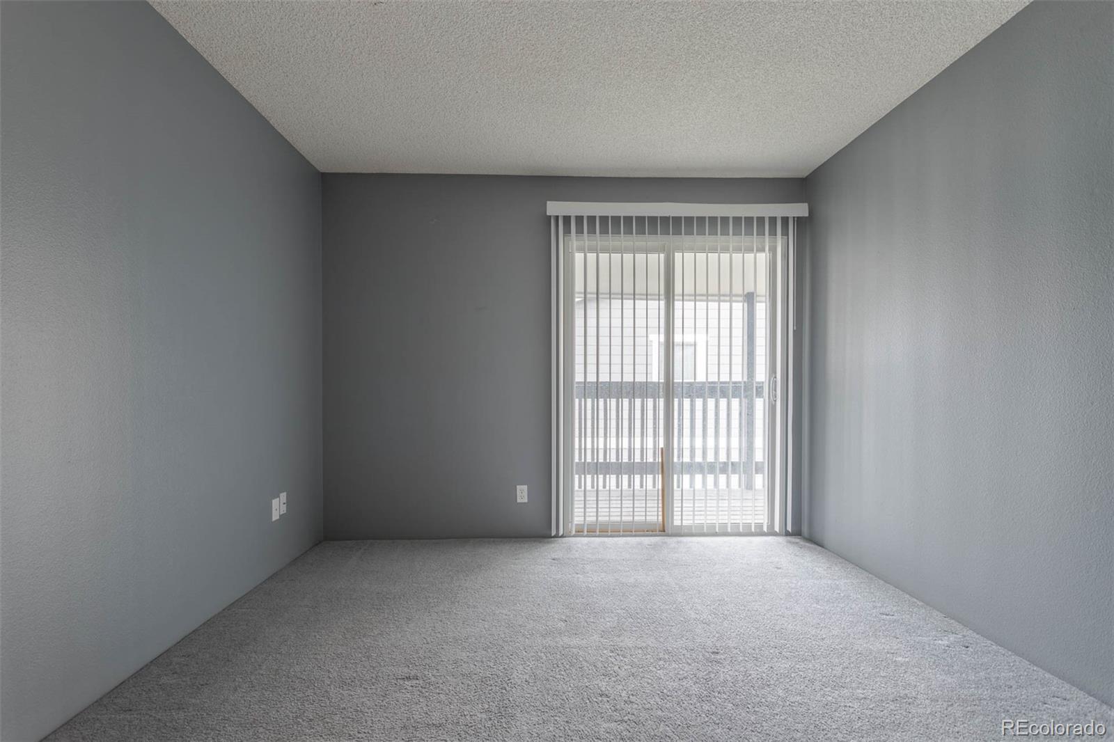 3462 South Eagle Street, Unit 201 Aurora, CO 80014 - Photo 15 of 26 an empty room with a window