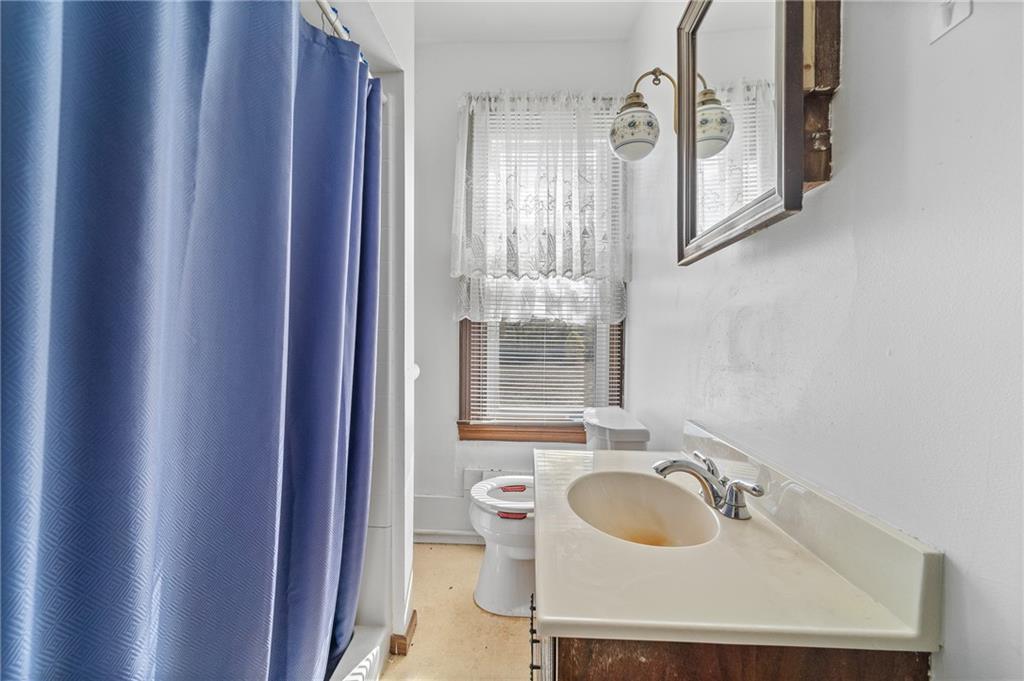 843 Pine Run Road Apollo, PA 15613 - Photo 16 of 35 a bathroom with a sink and a mirror