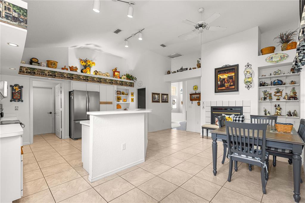 8418 Southwest 108th Pl Road Ocala, FL 34481 - Photo 15 of 80 a view of kitchen with furniture and wooden floor