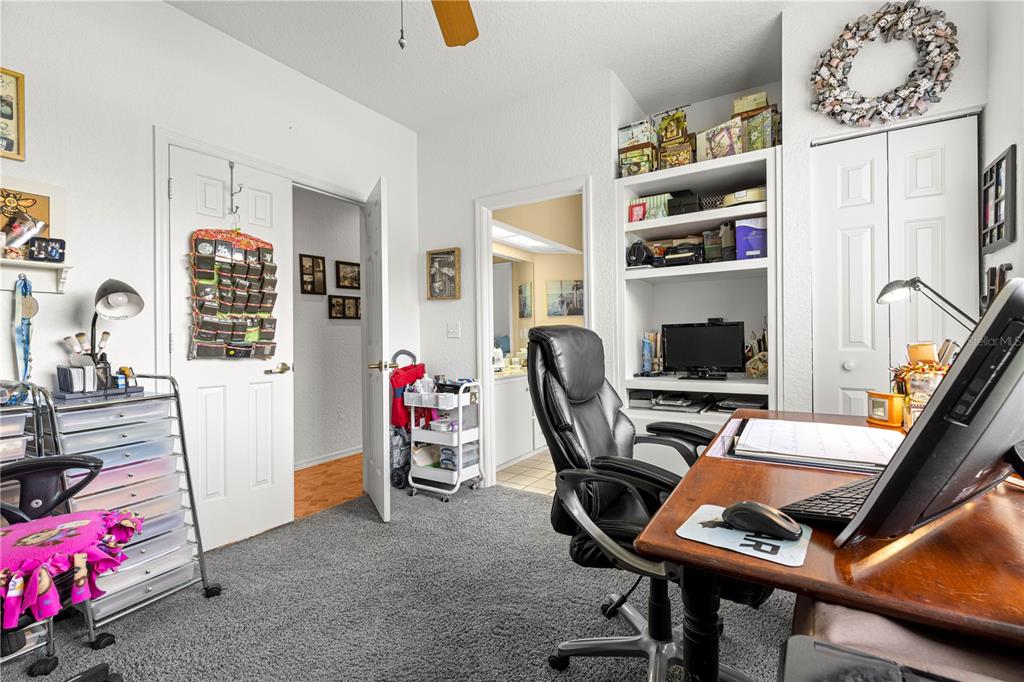 8418 Southwest 108th Pl Road Ocala, FL 34481 - Photo 27 of 80 a view of a workspace with furniture and toys