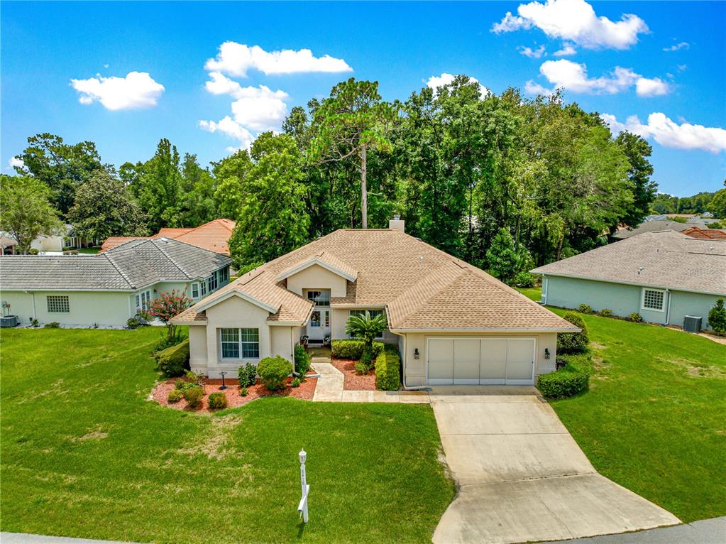 8418 Southwest 108th Pl Road Ocala, FL 34481 - Photo 53 of 80 a aerial view of a house with yard patio and green space