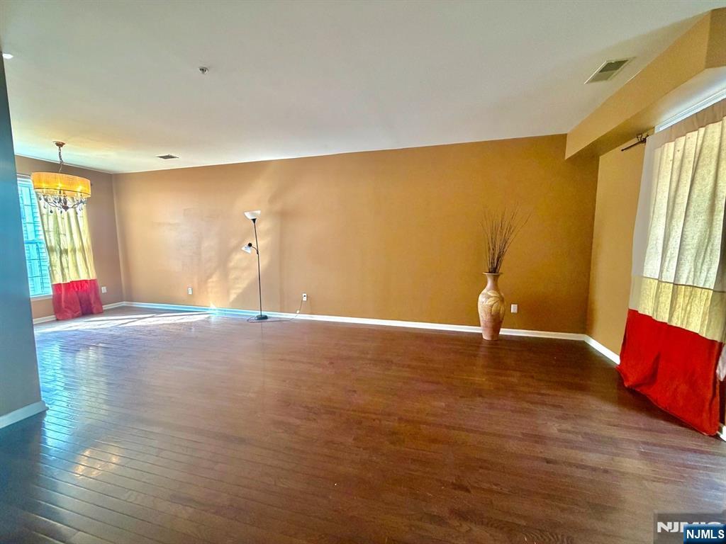 200 Dey Street, Unit 257 Harrison, NJ 07029 - Photo 3 of 21 a view of livingroom with furniture and window