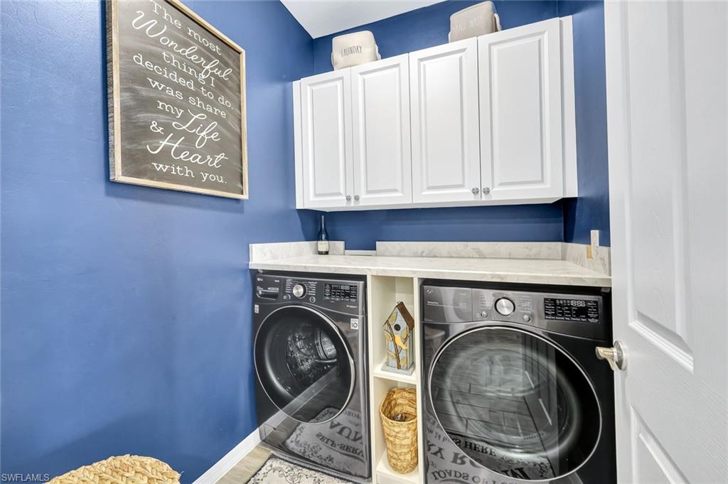 1261 Enbrook Loop Naples, FL 34114 - Photo 15 of 23 a utility room with dryer and washer