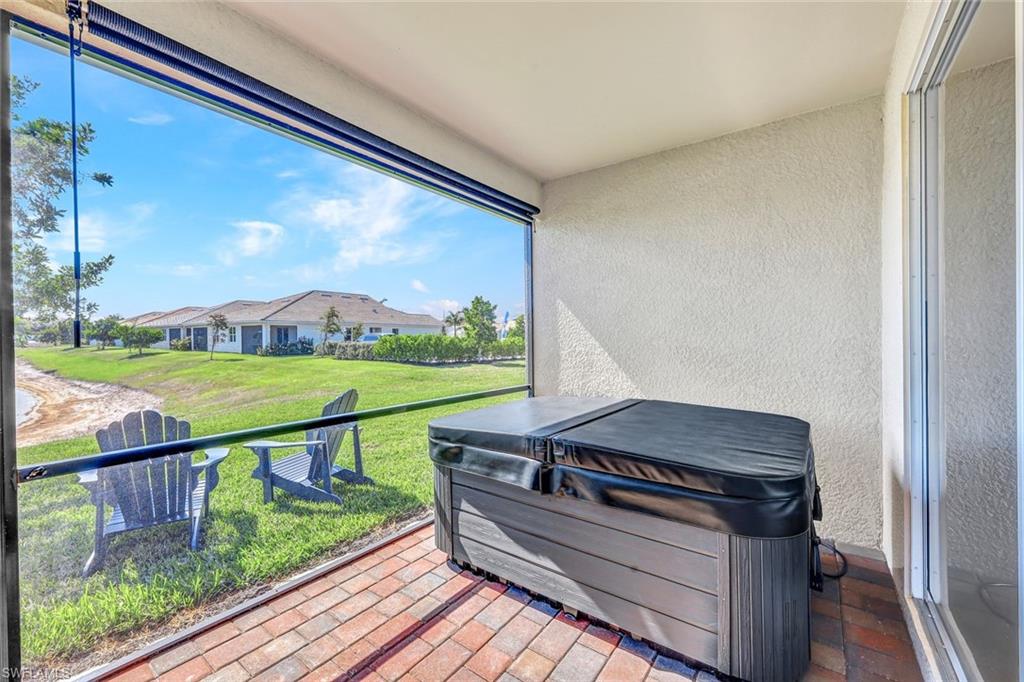 1261 Enbrook Loop Naples, FL 34114 - Photo 18 of 23 a view of a two chairs in the balcony