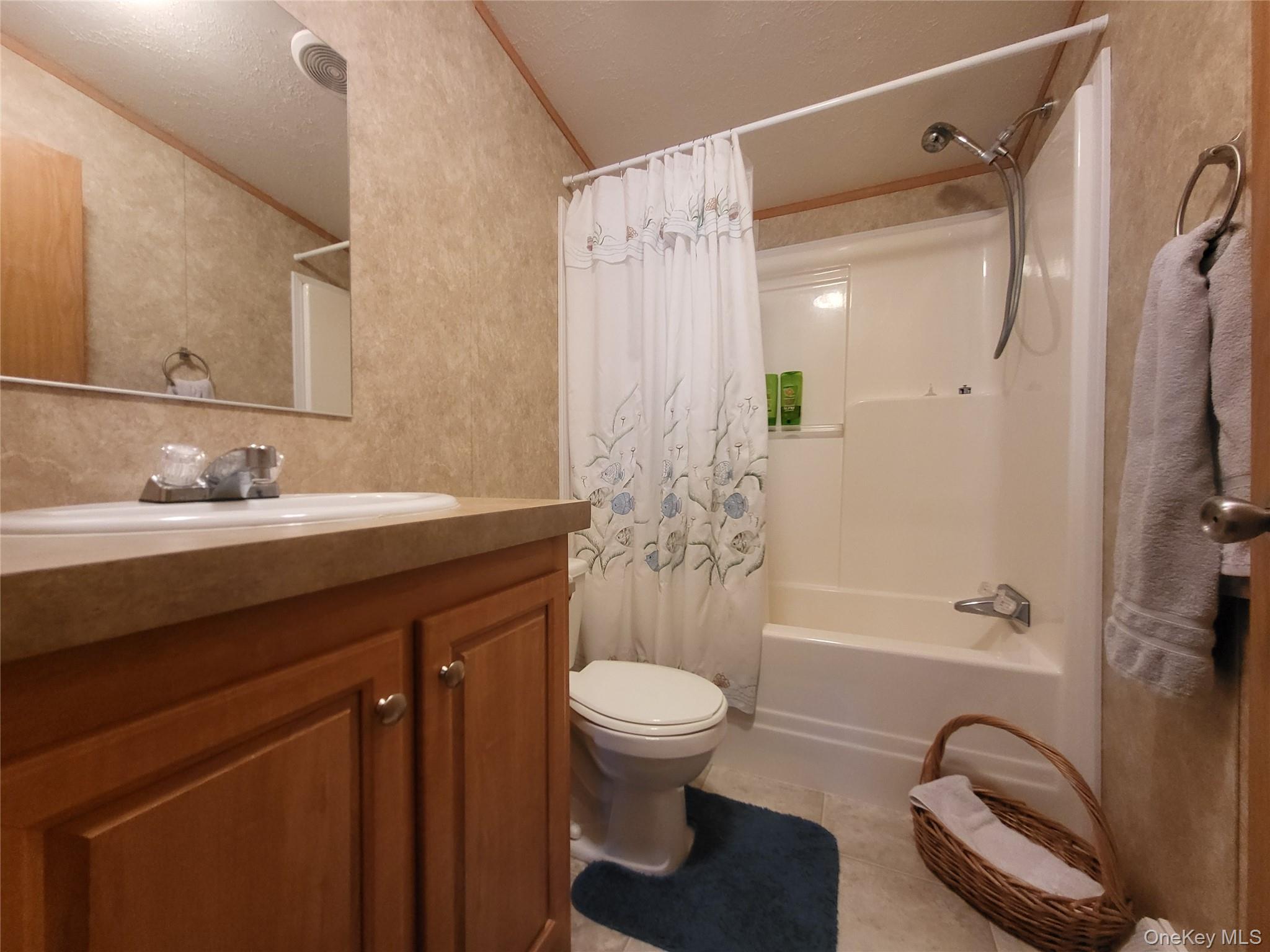 308 William Brown Road Fremont, NY 12741 - Photo 25 of 33 a bathroom with a bathtub shower sink vanity and toilet