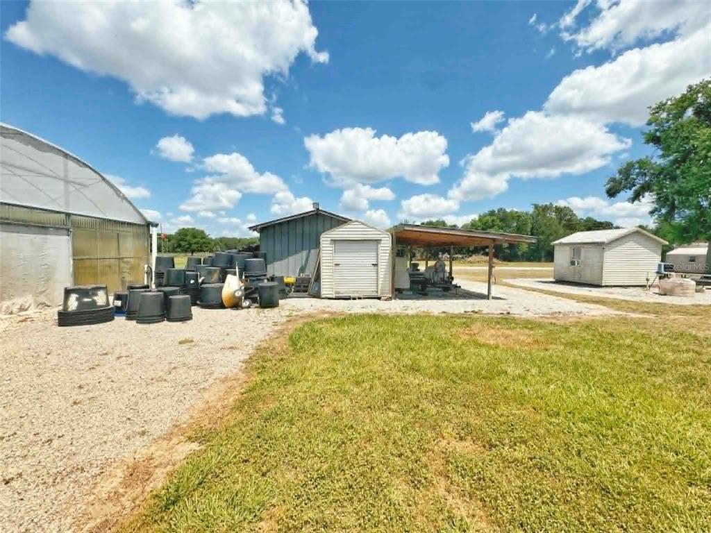 612 Morgan Road Winter Haven, FL 33880 - Photo 22 of 38 a view of a house with a patio