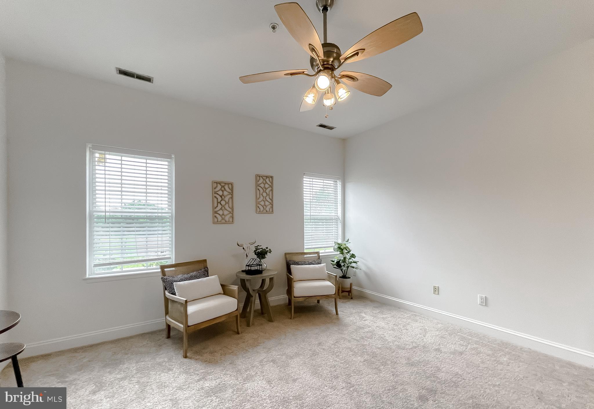 48673 Trapp Road St. Inigoes, MD 20684 - Photo 12 of 39 a living room with furniture and a window