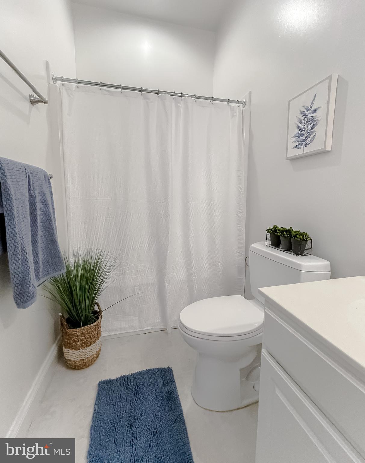 48673 Trapp Road St. Inigoes, MD 20684 - Photo 21 of 39 a bathroom with a toilet and a shower