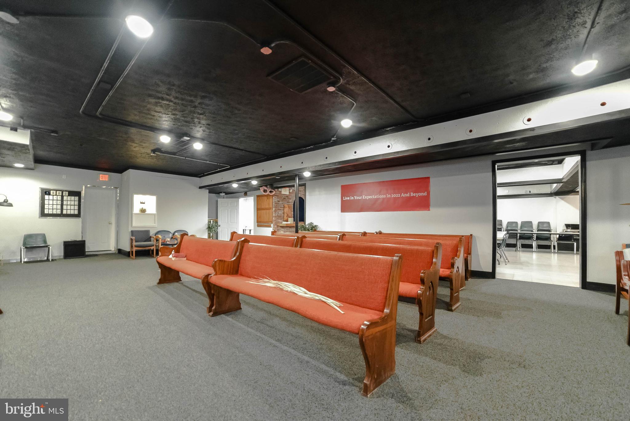 48673 Trapp Road St. Inigoes, MD 20684 - Photo 30 of 39 a projector room with furniture