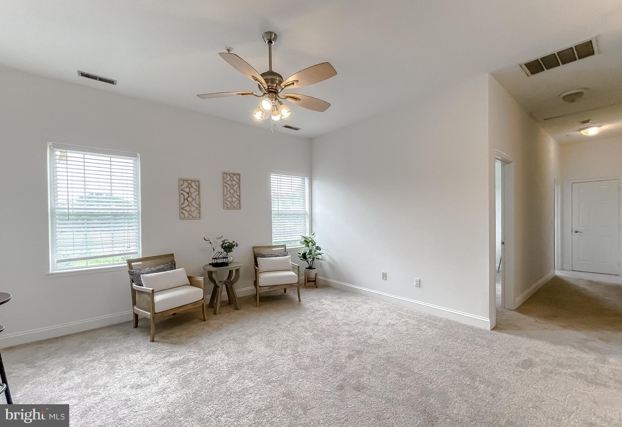 48673 Trapp Road St. Inigoes, MD 20684 - Photo 6 of 39 a living room with furniture and a window
