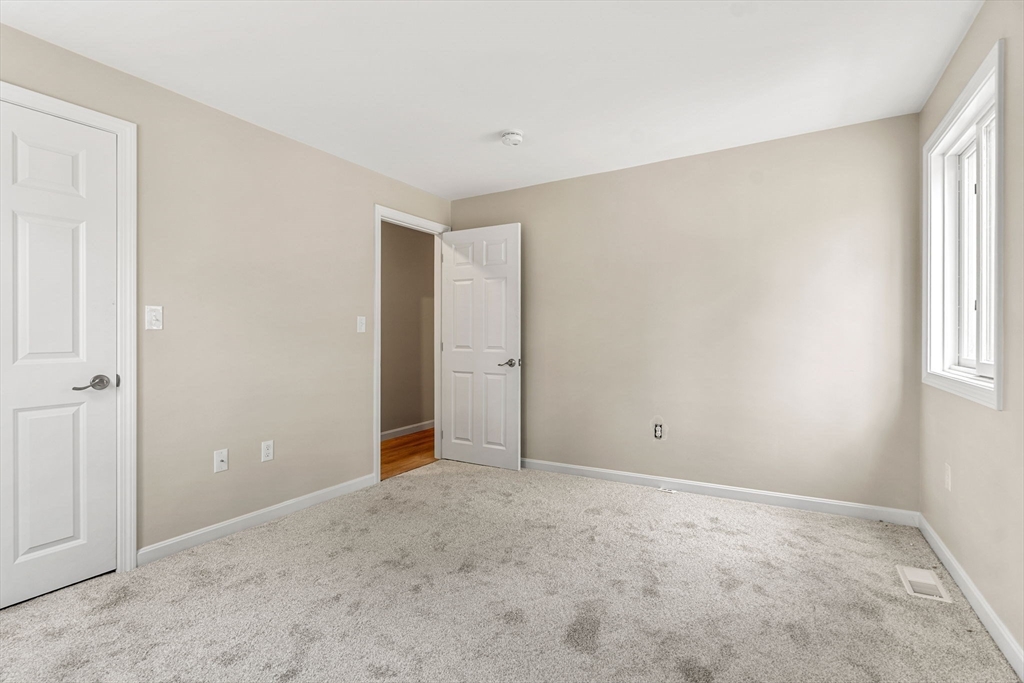 153 Coffin Road, Unit 10 Epping, NH 03042 - Photo 15 of 31 a view of an empty room