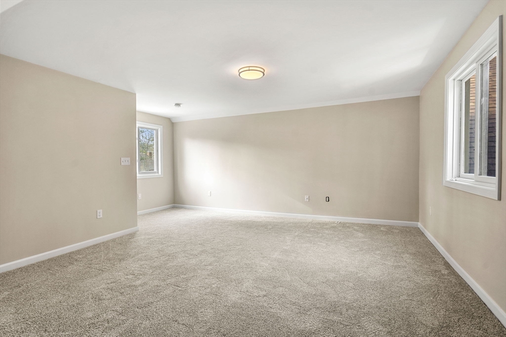 153 Coffin Road, Unit 10 Epping, NH 03042 - Photo 31 of 31 a view of an empty room with a window