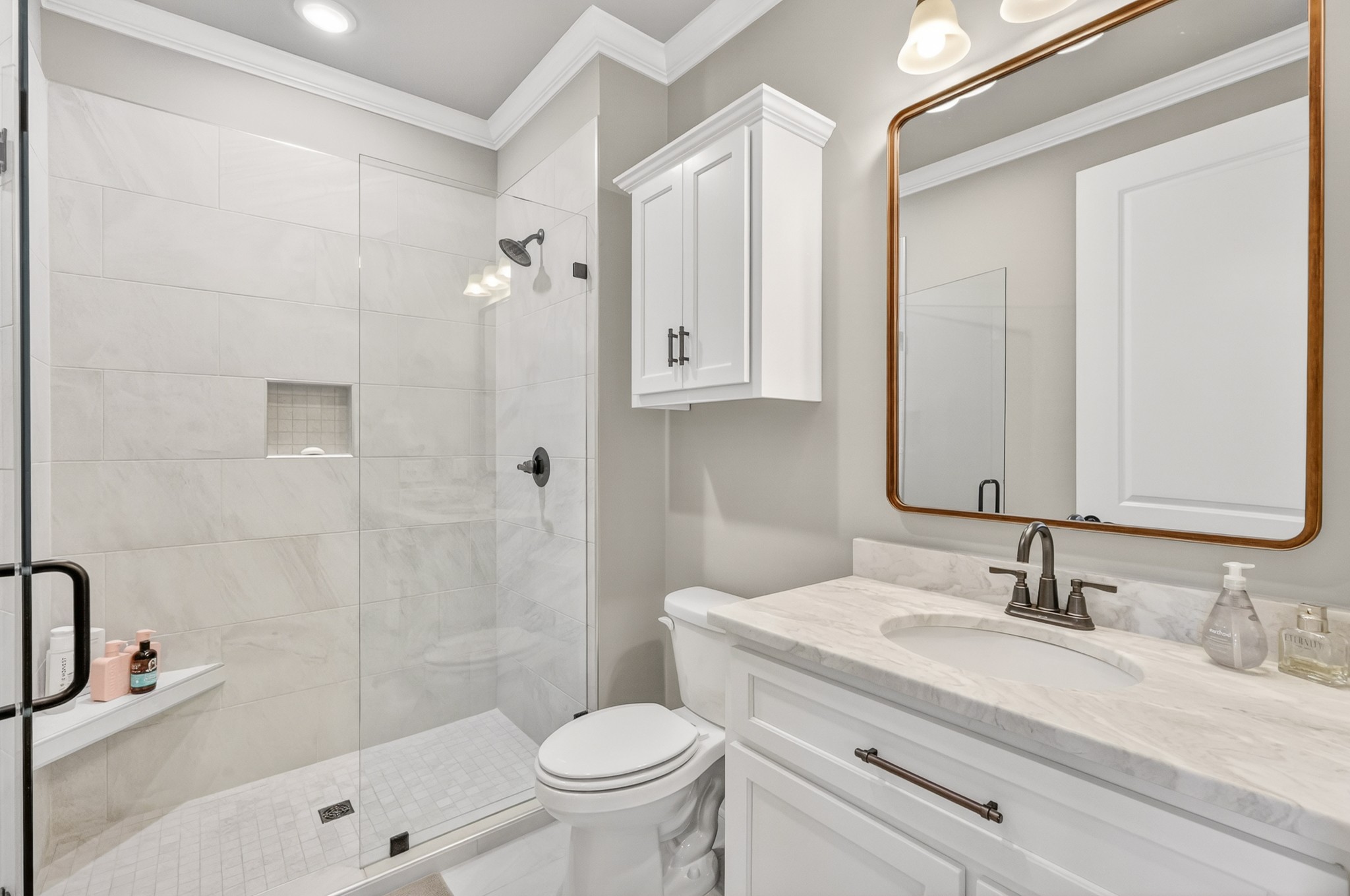 1176 Iron Bridge Road Columbia, TN 38401 - Photo 36 of 53 a bathroom with a sink a toilet and shower
