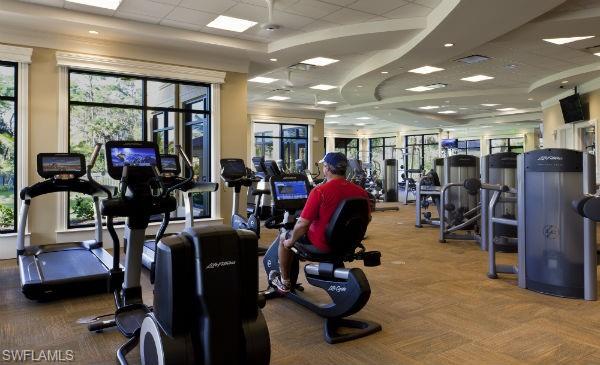 9584 Trevi Court, Unit 5227 Naples, FL 34113 - Photo 21 of 26 a view of a room with gym equipment