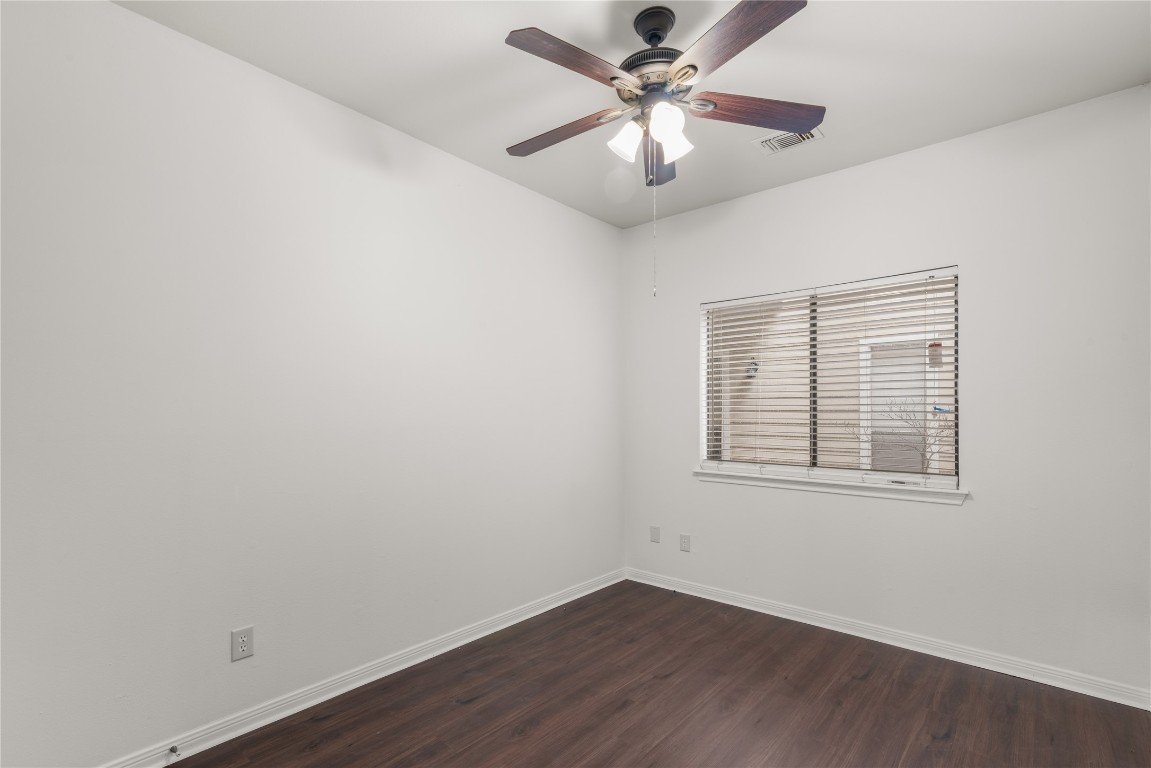 3500 Tangle Brush Drive, Unit 193 Spring, TX 77381 - Photo 14 of 26 Second bedroom also features a ceiling fan and window blinds providing a cozy atmosphere. Perfect for a bedroom or home office. You can see out both sides of the building from the windows.