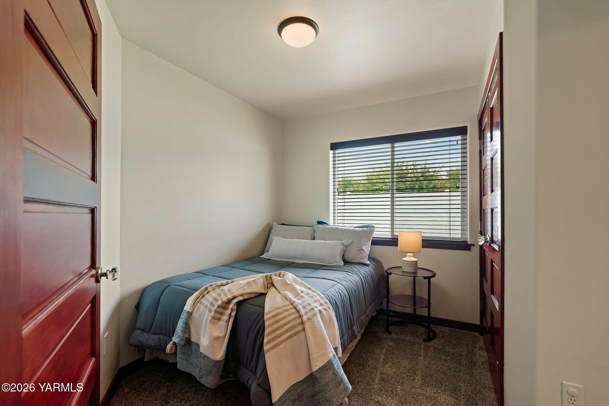 575 Parish Road Selah, WA 98942 - Photo 25 of 36 18_Bedroom_CozyAndLightFilled