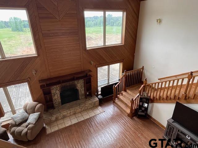 109 Cherry Blossom Road Ore City, TX 75683 - Photo 8 of 32 a living room with furniture fireplace and a window