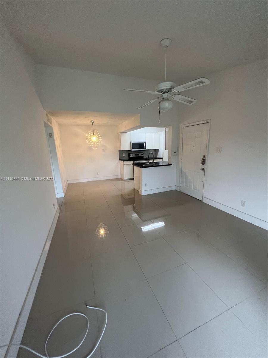 The Hammocks Miami, FL 33196 - Photo 14 of 20 a kitchen with a sink cabinetry and a ceiling fan