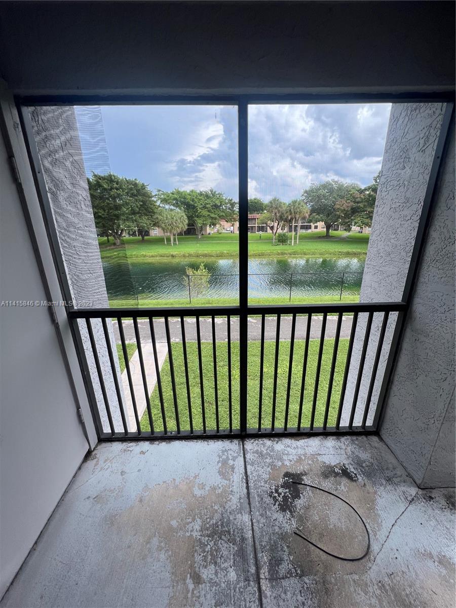 The Hammocks Miami, FL 33196 - Photo 4 of 20 a view of balcony with a couple of chairs