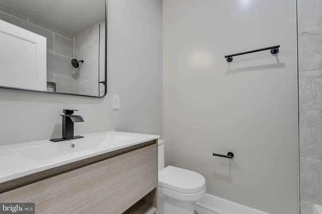a bathroom with a sink and a toilet