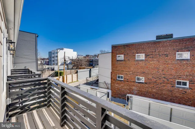 a view of balcony with furniture