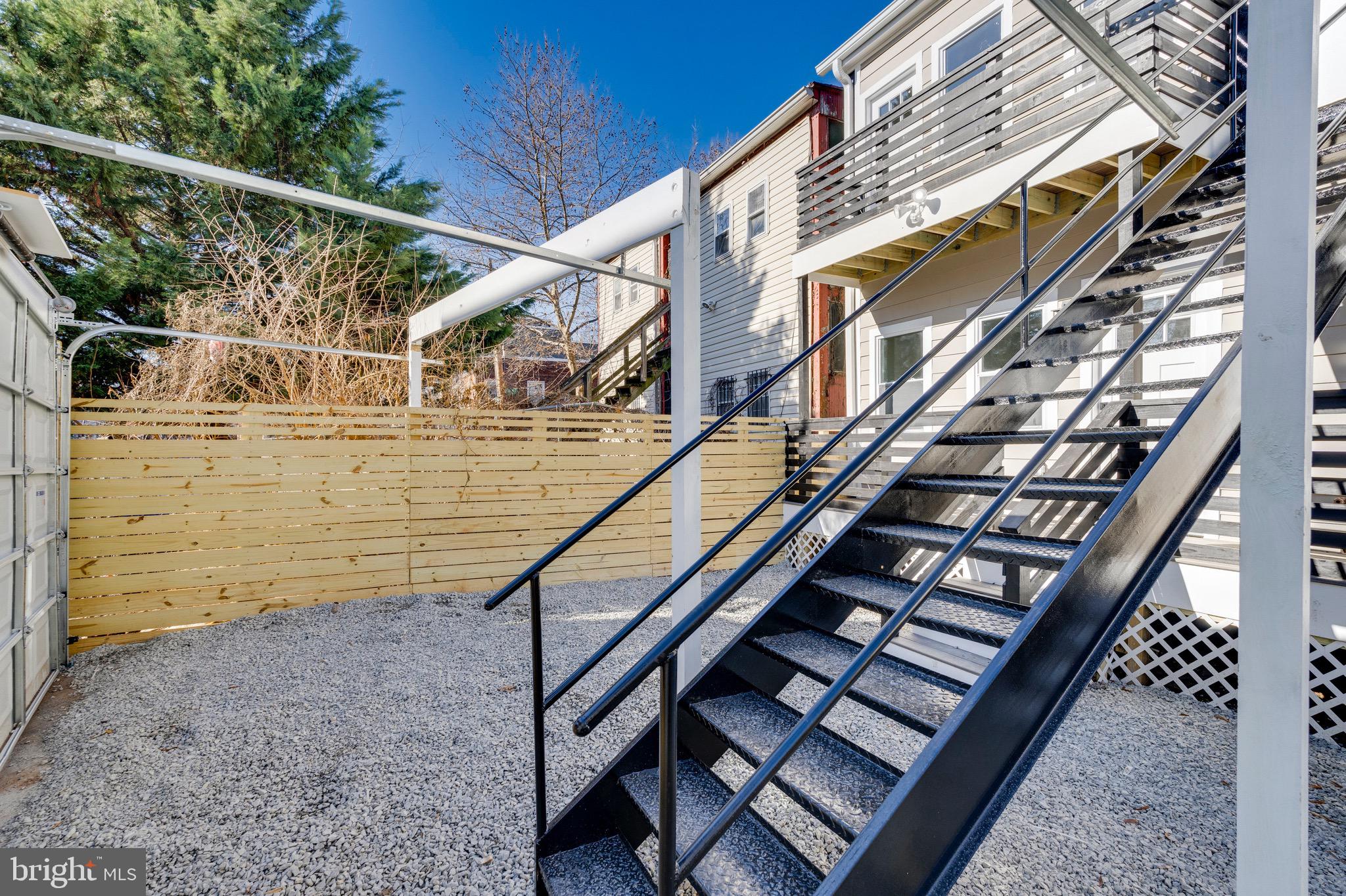 1703 West Virginia Avenue Northeast, Unit 2 Washington, DC 20002 - Photo 45 of 54 a view of entryway with wooden stairs