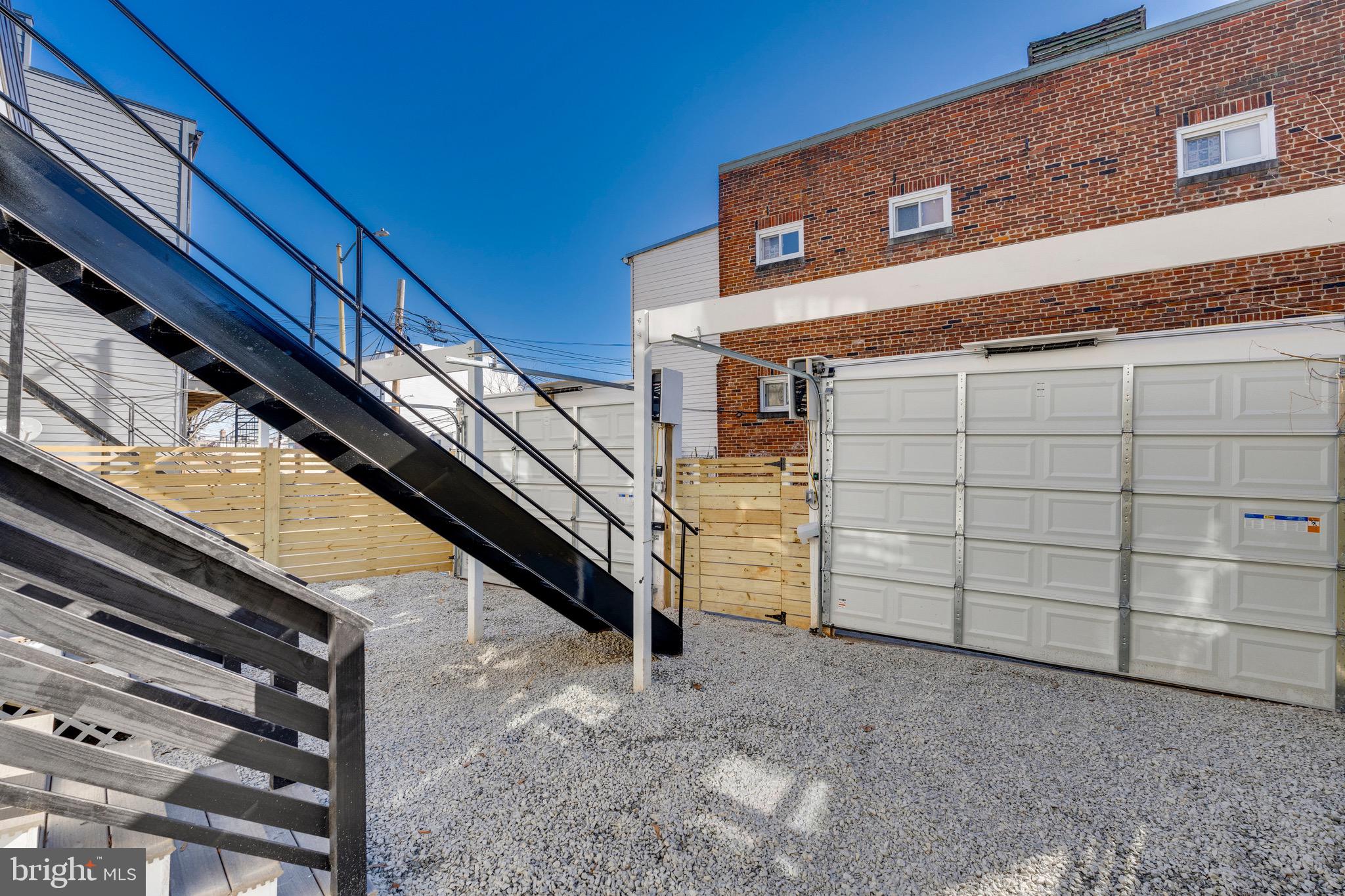 1703 West Virginia Avenue Northeast, Unit 2 Washington, DC 20002 - Photo 47 of 54 a view of a house with a garage
