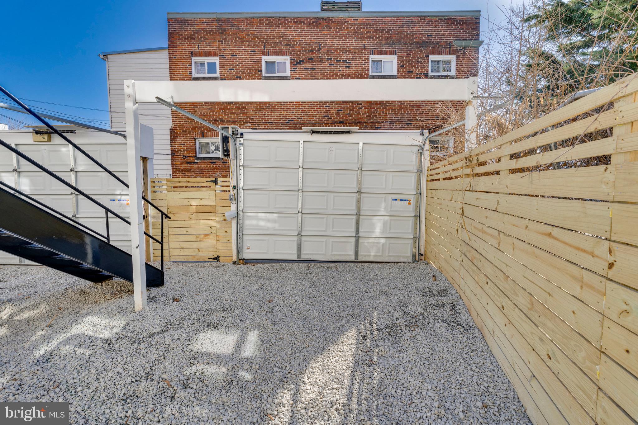 1703 West Virginia Avenue Northeast, Unit 2 Washington, DC 20002 - Photo 48 of 54 a view of a house with a garage