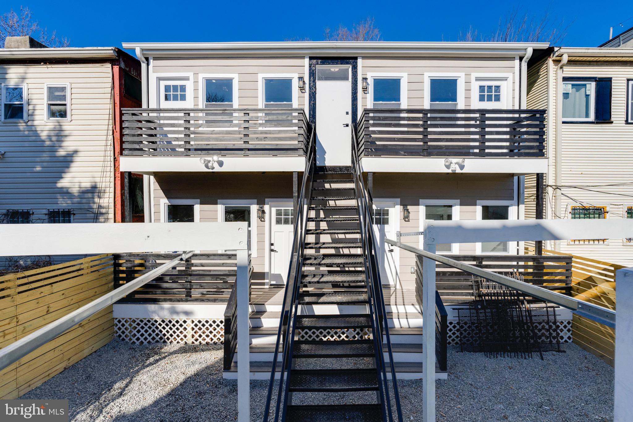 1703 West Virginia Avenue Northeast, Unit 2 Washington, DC 20002 - Photo 53 of 54 a view of a house with barbeque and wooden floor